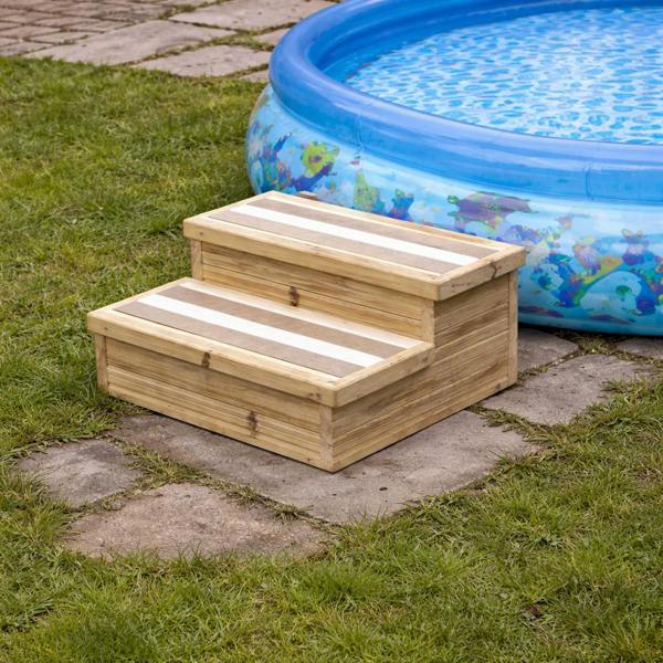 Two-step wooden garden steps with white grip strips near paddling pool