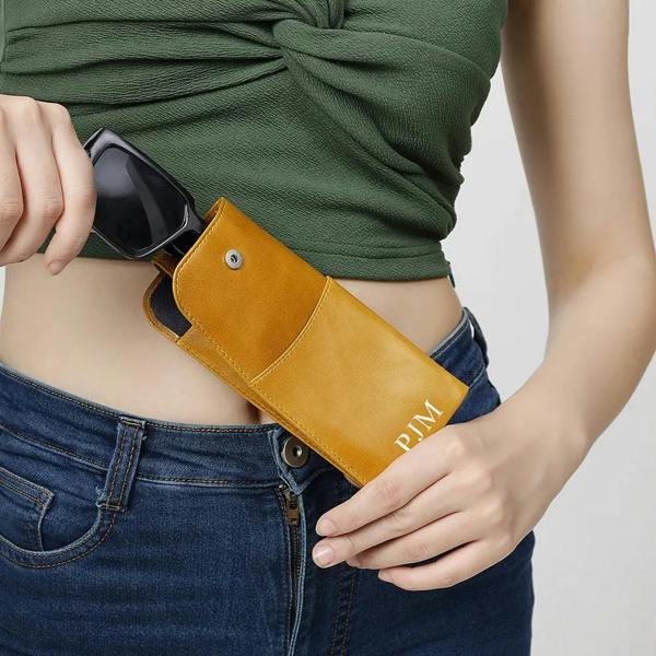 Person holding Yellow Leather Glasses Case