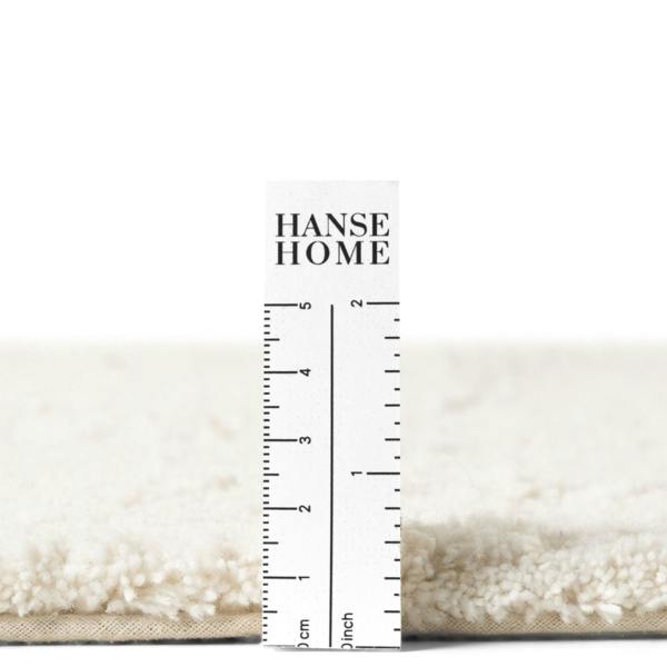 Hanse Home rug with a ruler for scale on a white background
