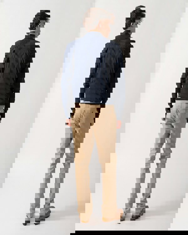 Back shot of a Model wearing a Ted Baker Baxters Mens Long Sleeve Slim Stretch Shirt in Navy