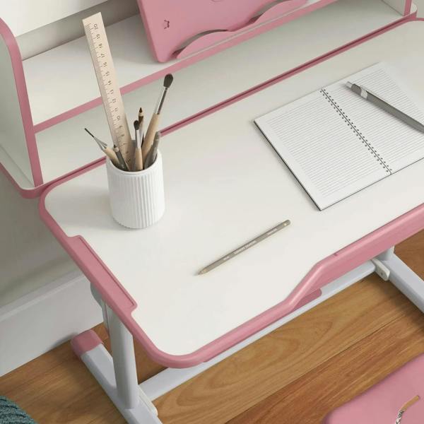 Pink kids study table top with pencil cup area, ruler marks, and white frame
