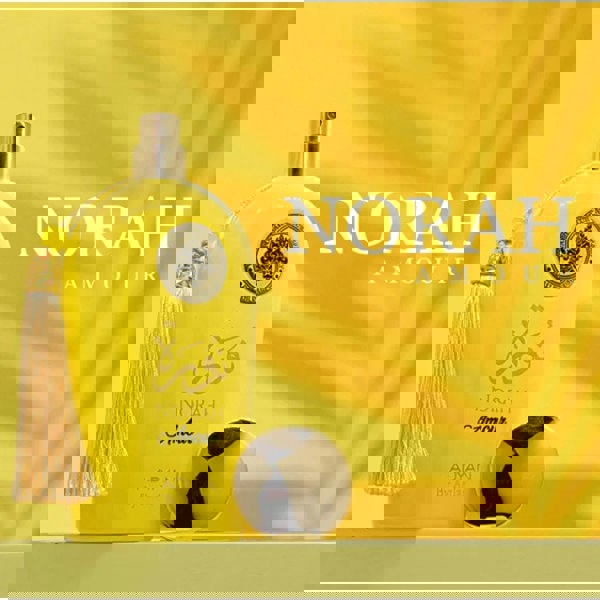 Norah Amour Eau De Parfum 100ml bottle on yellow background