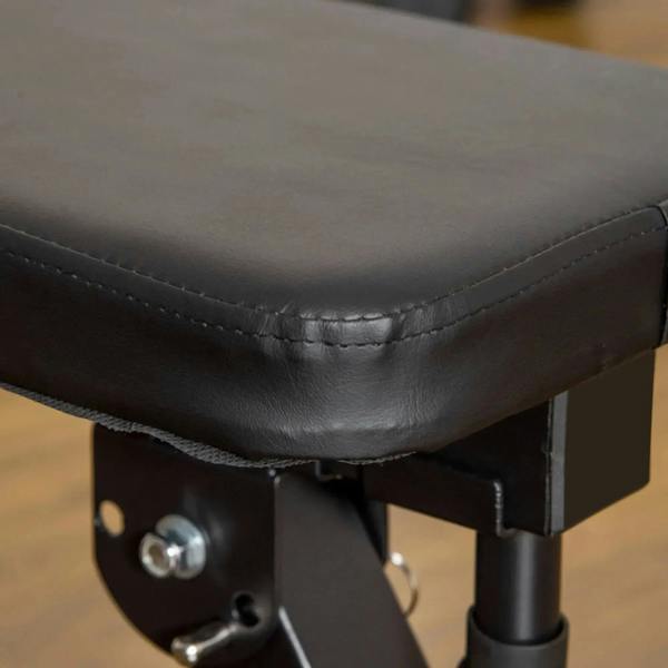 Black padded bench seat with stitched leather-look cover and adjustment hardware