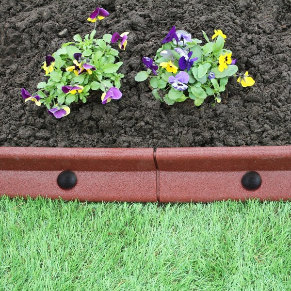 Flexible terracotta lawn edging, 1.2m long, with smooth texture, showcasing vibrant flowers and rich soil against green grass