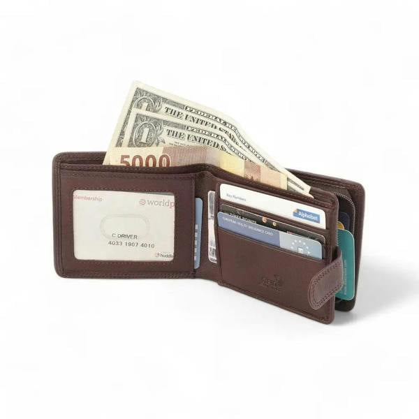 Brown leather wallet with money and cards on a white background