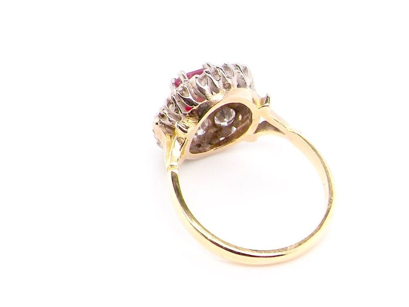 Vintage Tom A fine ruby and diamond cluster ring