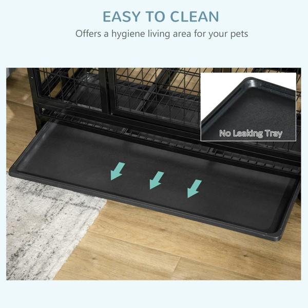 Black cleaning tray inside metal dog crate, no-laking tray shown
