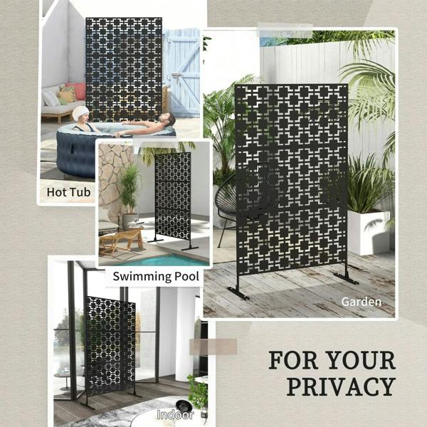 Black metal privacy screen divider used around an outdoor hot tub area with geometric pattern
