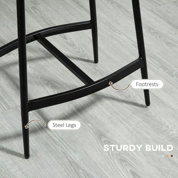 Black steel bar stool frame with curved footrest and upholstered seat