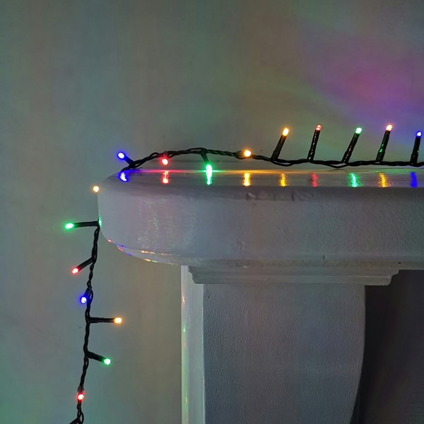 Samuel Alexander 1000 LED 25m Indoor Outdoor Christmas Multi Function Mains Operated String Lights with Timer in in Multicoloured