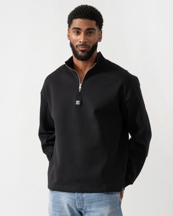 model wearing a HUGO Danovotop Mens Sweatshirt in Black