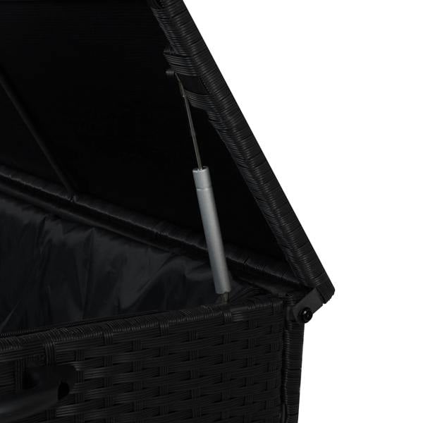 Black rattan cushion storage box with a textured weave, open lid, and sturdy silver hinge, perfect for outdoor or indoor use
