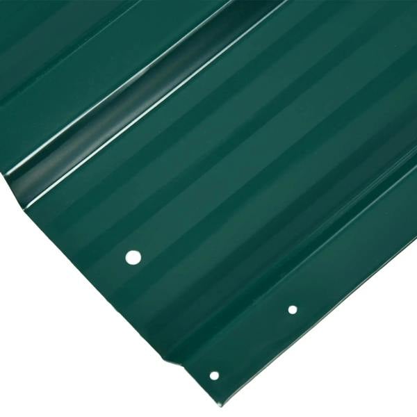 Green corrugated steel roof sheet panel corner with mounting holes