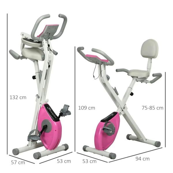Folding exercise bike showing pink flywheel and multiple size measurements