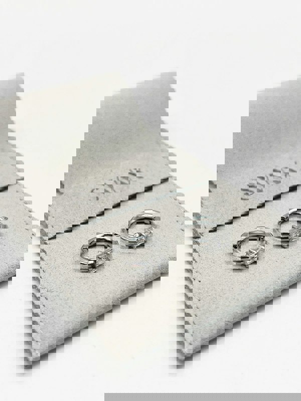 SVNX Crystal Huggie Hoops - Pouch Included