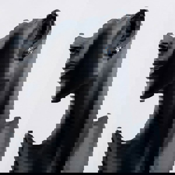 T. H. Baker Sterling Silver Rhodium Plated Blue Cubic Zirconia Pave Knot Stud Earrings 8.57.0030