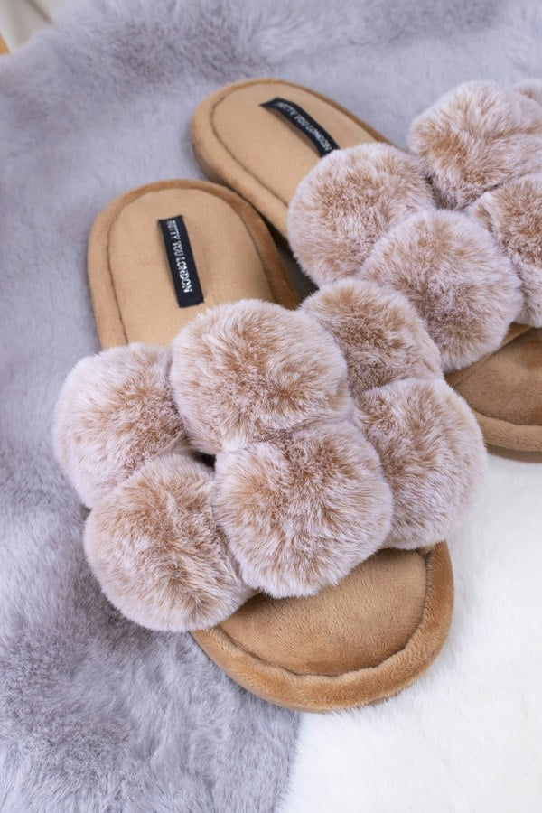 Dolly women's slider slippers in caramel with oversized faux fur pom poms from Pretty You London