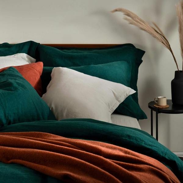 Dark Emerald French Linen 40cm Deep Fitted Sheets styled in a bedroom 2 | Soak and Sleep