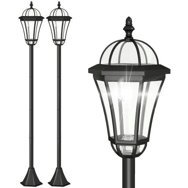 Black solar lantern pathway light post with curved glass panels and decorative top.