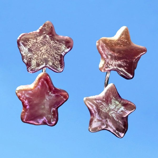 Star-shaped pearl ear jacket earrings in pink tones by LENAE London.