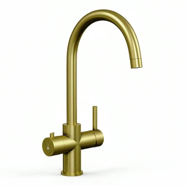 Brushed gold boiling water tap on a white background
