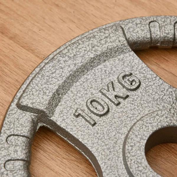 Cast iron weight plate with embossed 10KG marking, speckled gray
