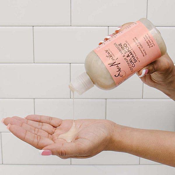 Coconut & Hibiscus Curl & Shine Shampoo and conditioner together to achieve naturally fragrant, frizz-free, healthy-looking curls.
