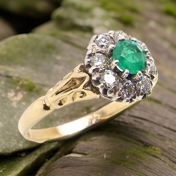 Vintage Tom A vintage Emerald and Diamond cluster ring