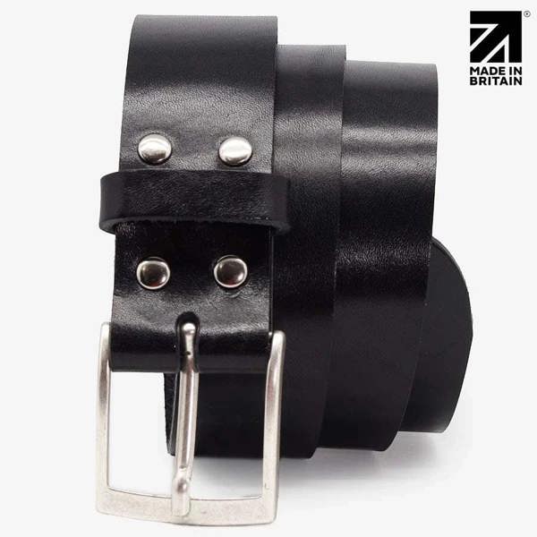 Close-up of the polished nickel buckle on a black full-grain Italian leather belt