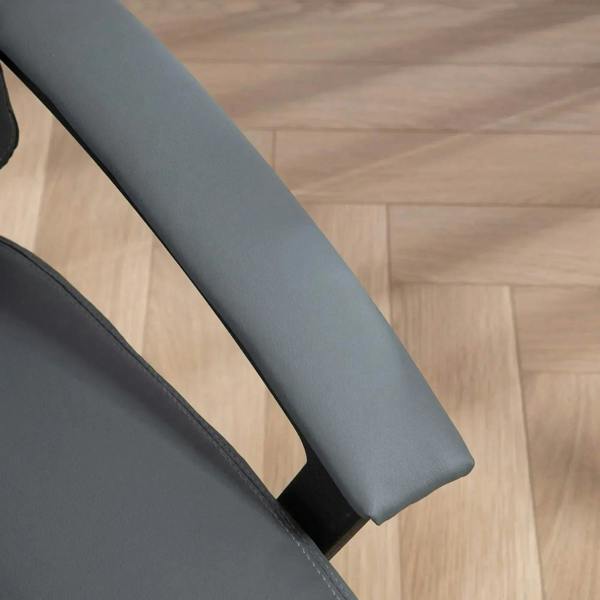 Dark grey upholstered chair side with seam stitching and cushioned armrest