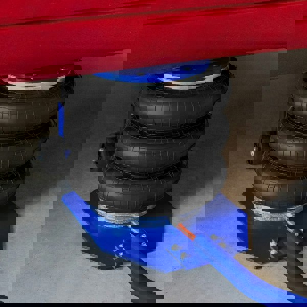 Air Bag Jack 3.5T with long lever handle, featuring three stacked black rubber bags on a blue base, designed for lifting vehicles