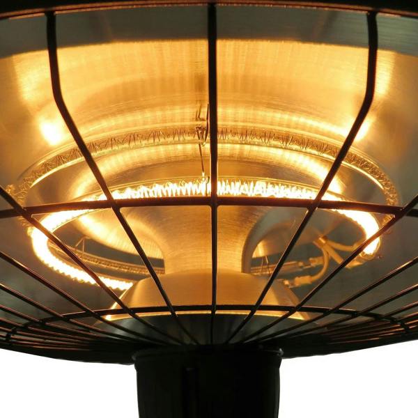 Ceiling-mounted view of black infrared patio heater with glowing inner heating grid