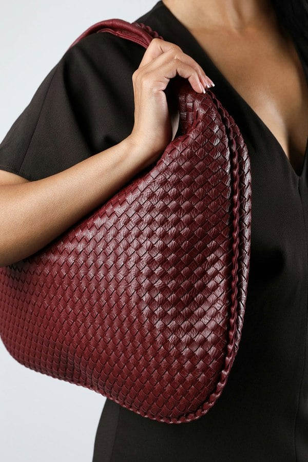 Where's That From Barber Large Contorted Shoulder Bag in Burgundy Woven Faux Leather
