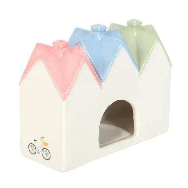 House incense burner and tealight holder, side view with large arch cutout and pastel roof colors