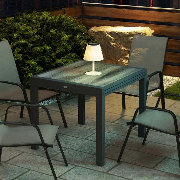 Grey rectangular outdoor dining table with wood-look tabletop and aluminium frame