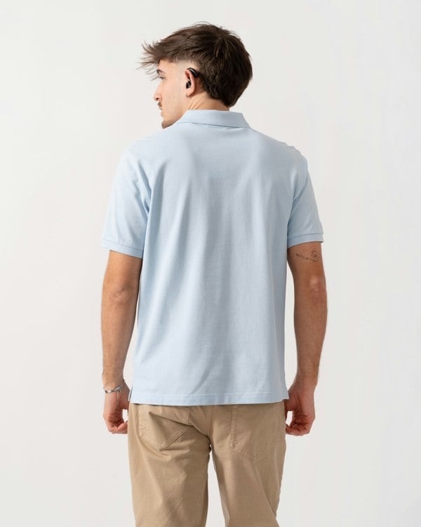 back shot of a model wearing a GANT Mens Regular Fit Short Sleeve Shield Logo Pique Polo in Fresh Blue