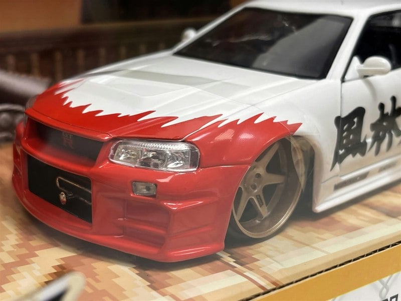 a red and white toy car