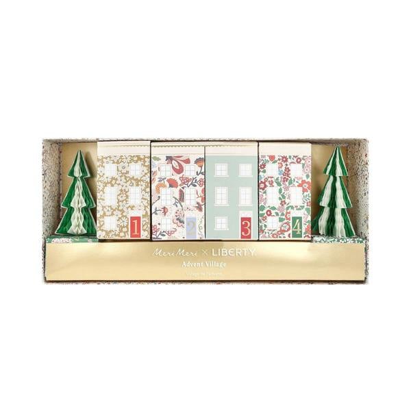 Liberty print advent calendar village packaged neatly inside its gift box with gold foil lettering.