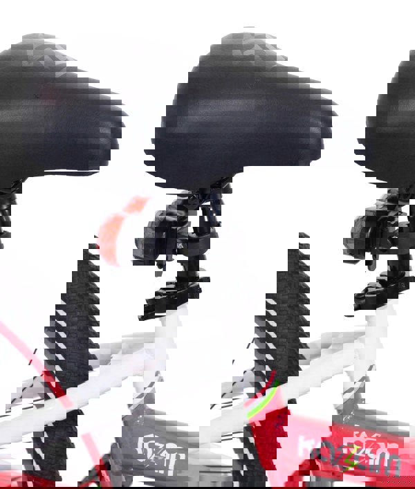 Close-up of Pink tag-along bike