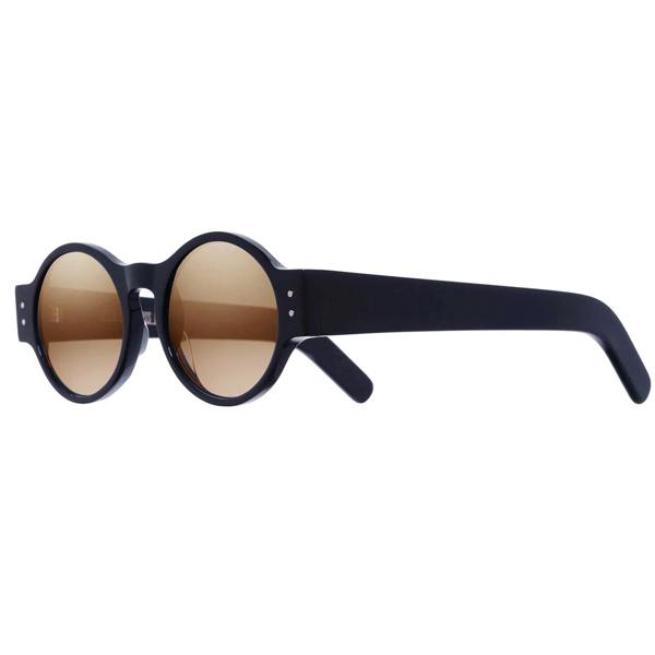 Cutler & Gross 1374 round sunglasses in a translucent navy blue frame