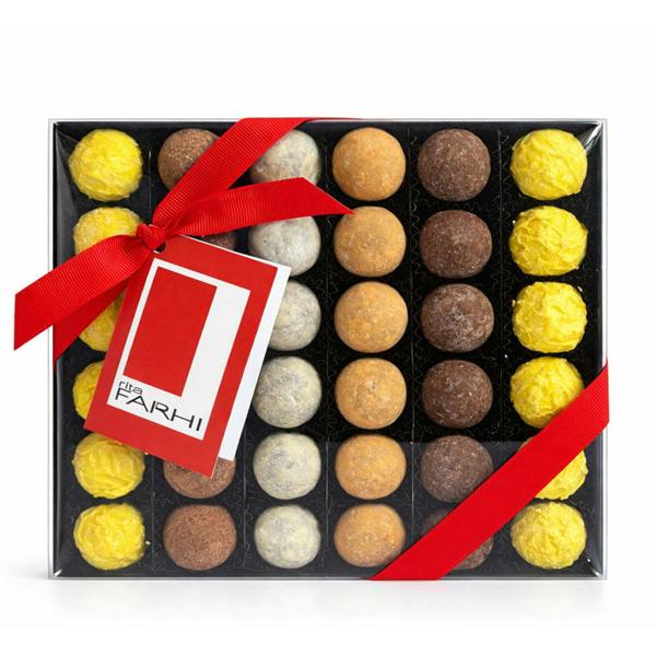 Assorted luxury chocolate truffles with smooth centres in elegant Rita Farhi gift box