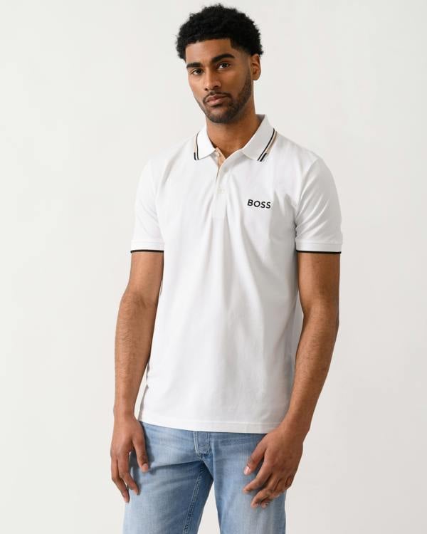model wearing a BOSS Green Paddy Pro Mens Cotton Blend Polo Shirt With Contrast Logos in Natural 103 colour