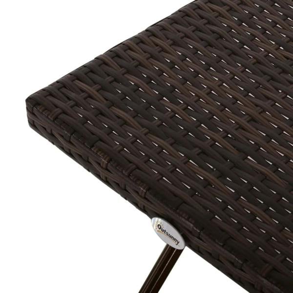 Close-up of brown woven rattan tabletop corner on a folding side table