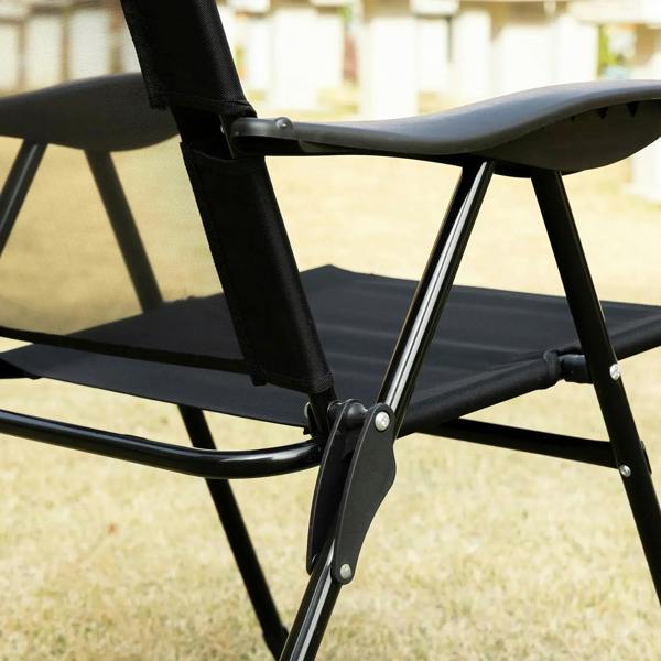 Black folding recliner patio chair close-up of armrest and steel frame with locking points
