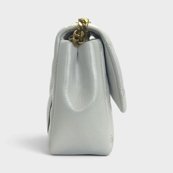 Supplied Fashion Willa glazed white leather shoulder bag with gold chain strap, side view.
