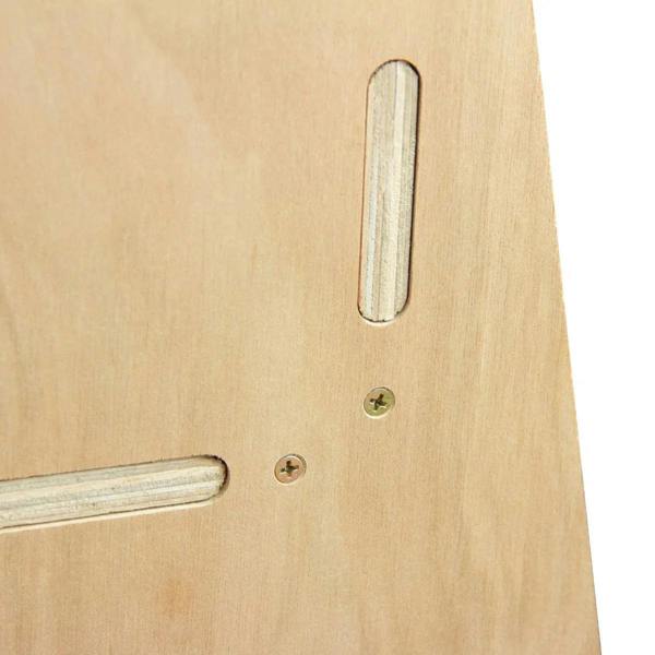 Close-up of Ford Transit Custom toolbox van racking showing smooth wood texture, precision-cut slots, and metal screws for secure assembly