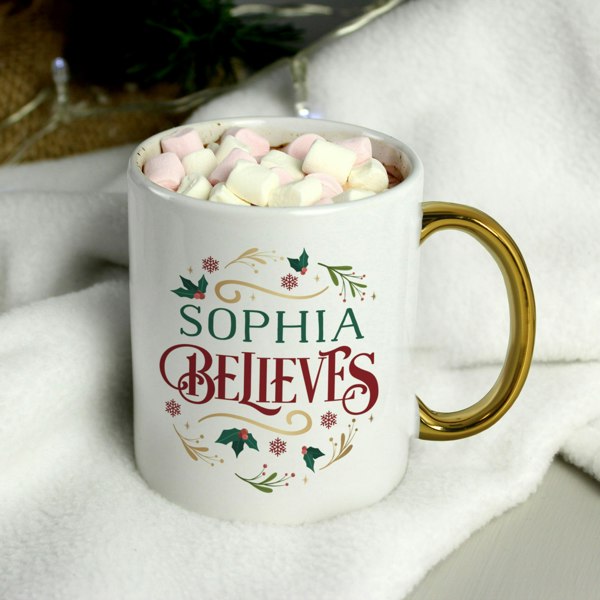 Personalised Memento Company Personalised Believes In Christmas Gold Handled Mug
