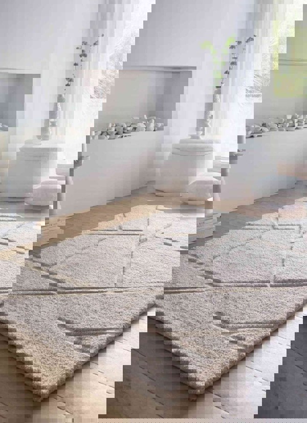 Scandinavian deep pile cream and grey rug in a modern living space, enhancing warmth and comfort with minimalist design.