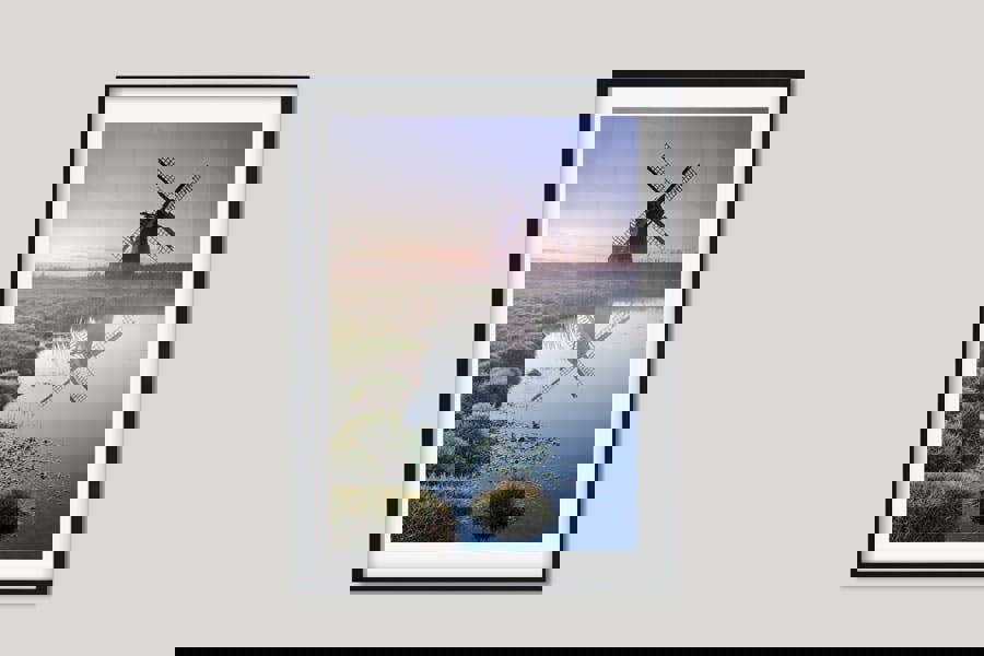 landscape print with windmill at sunrise