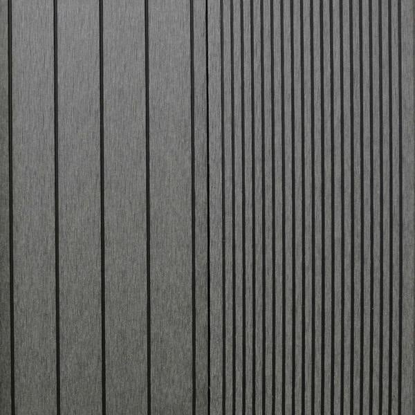 Castle Grey Jardí Composite Decking planks featuring a textured surface with vertical grooves, ideal for outdoor spaces and patios